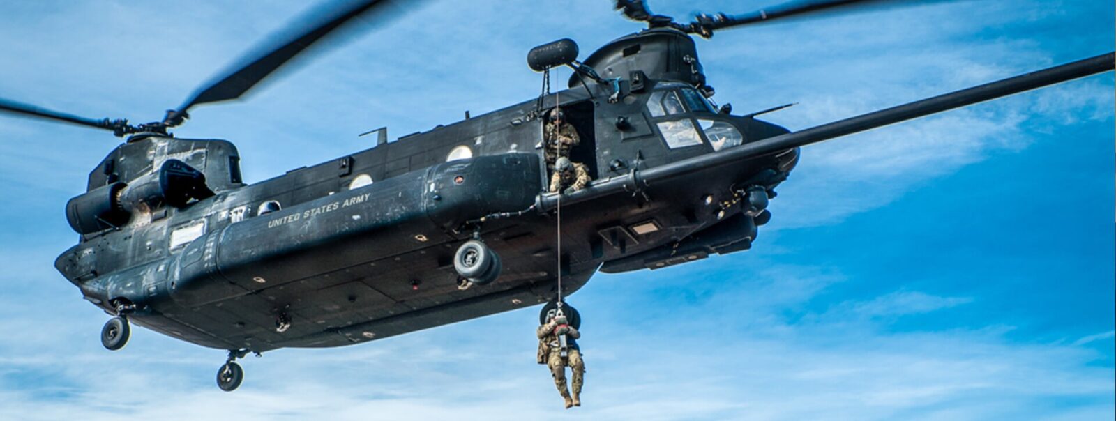 US Army Chinook helicopter fast-roping.